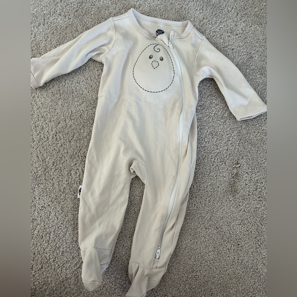 Nested Bean Cream Baby Footie with Cute Face Design